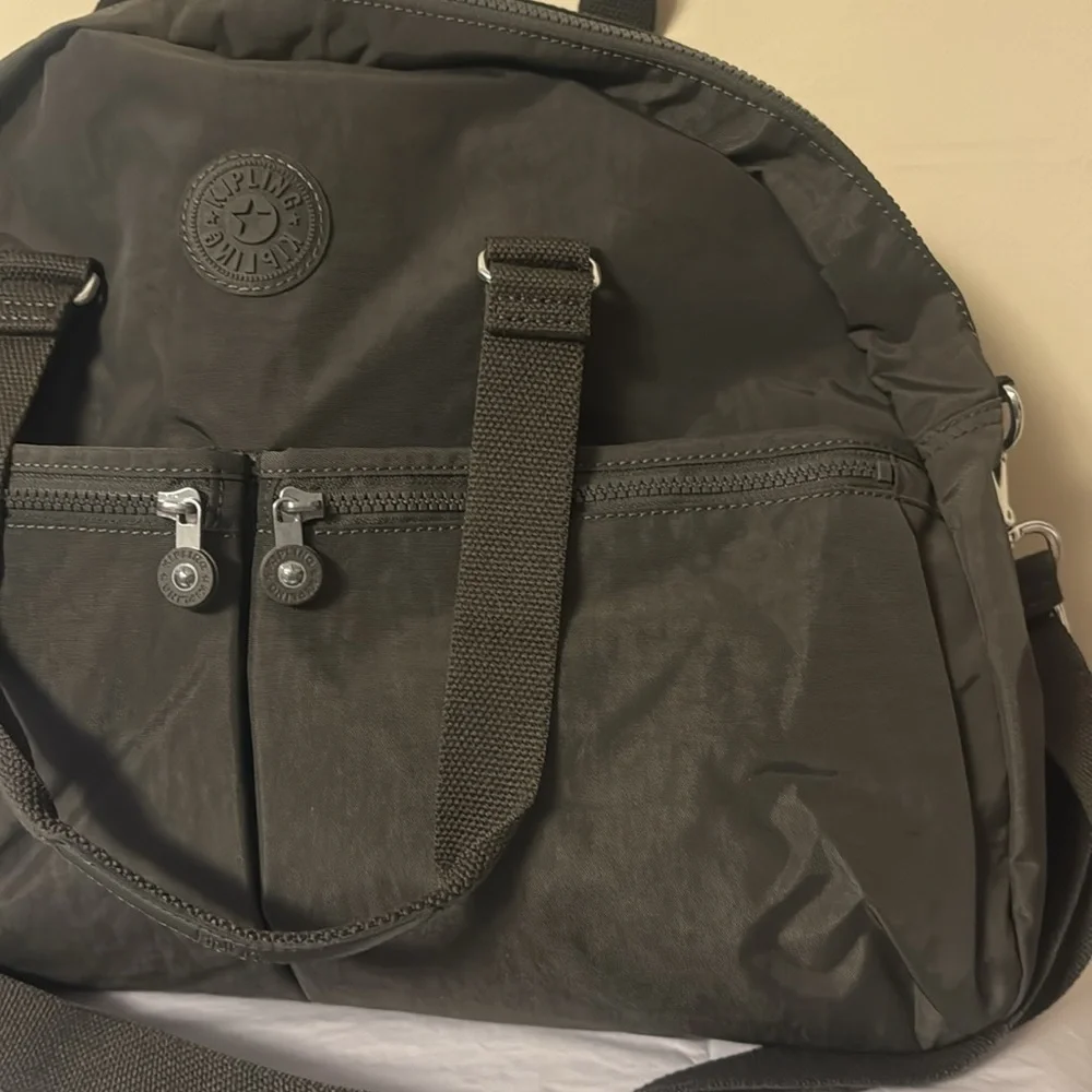 Kipling Black Duffel Bag, new, outside pockets, inside pockets, unisex